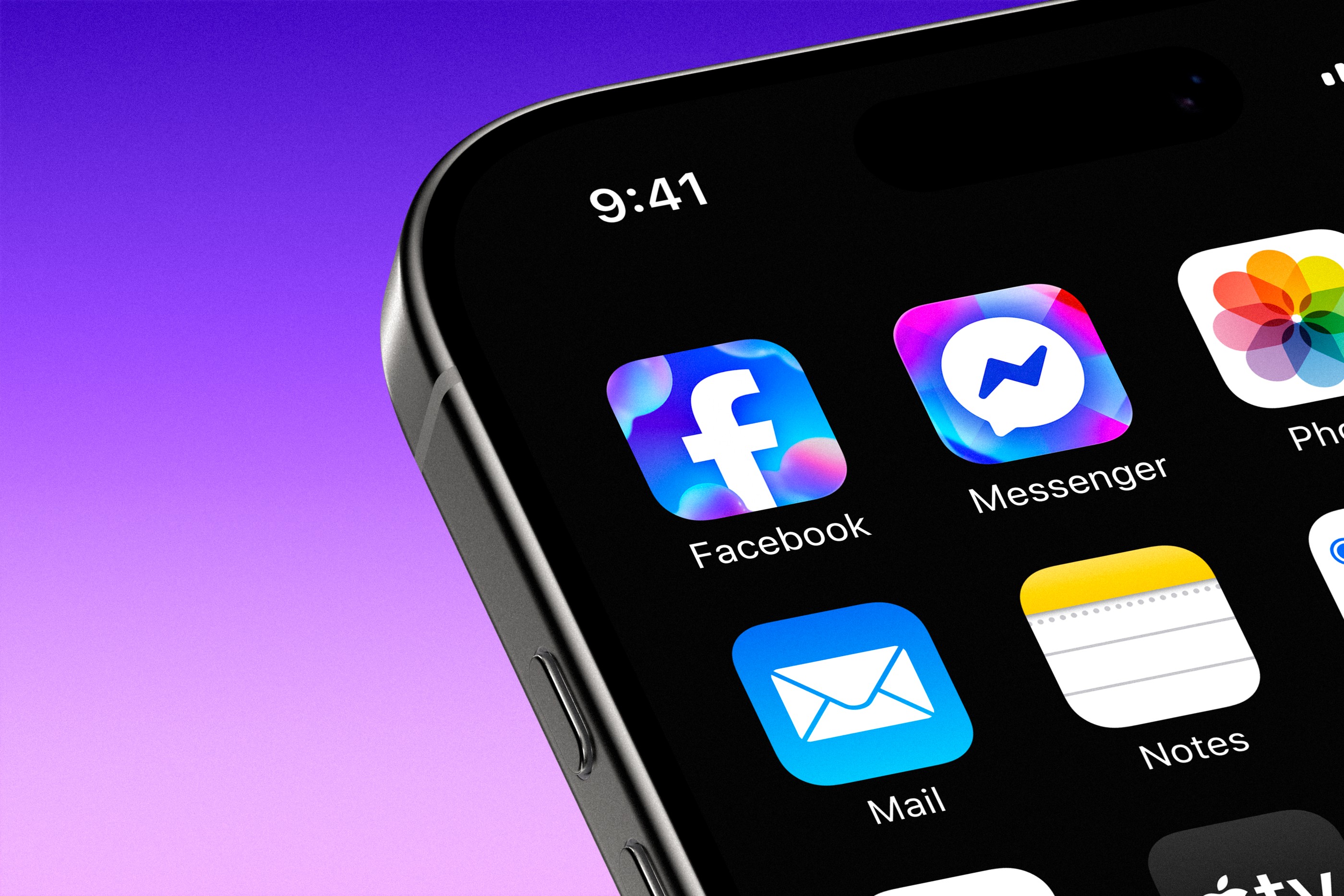 An iPhone home screen with the new Facebook and Messenger app icons