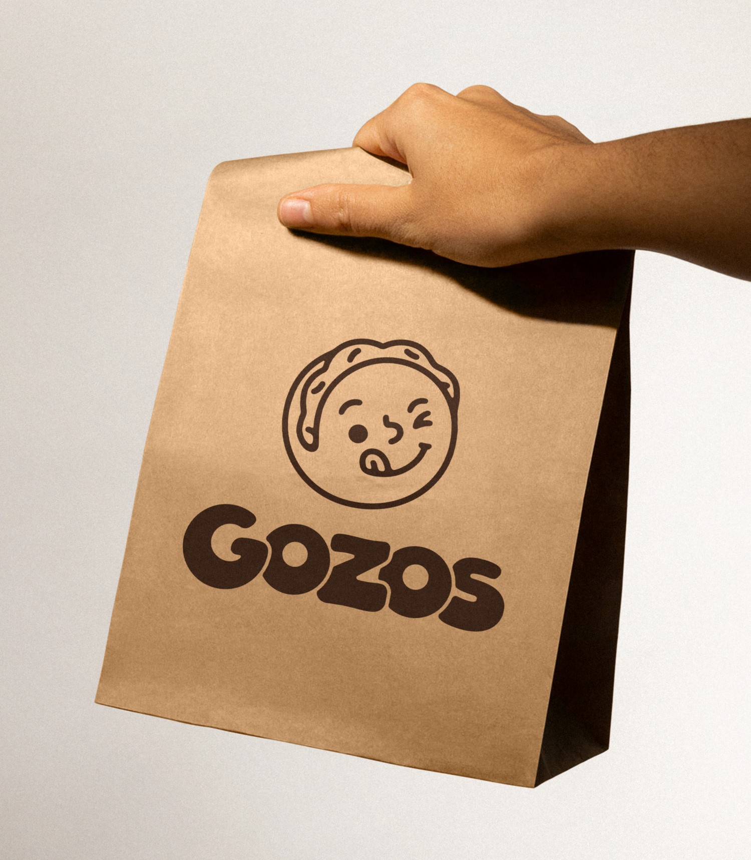 Kraft takeaway bag with the Gozos mascot and wordmark