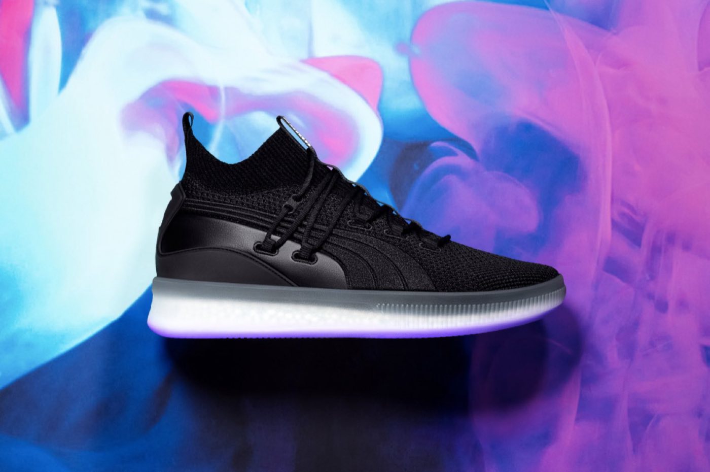 Sneaker floating in pink and blue smoke