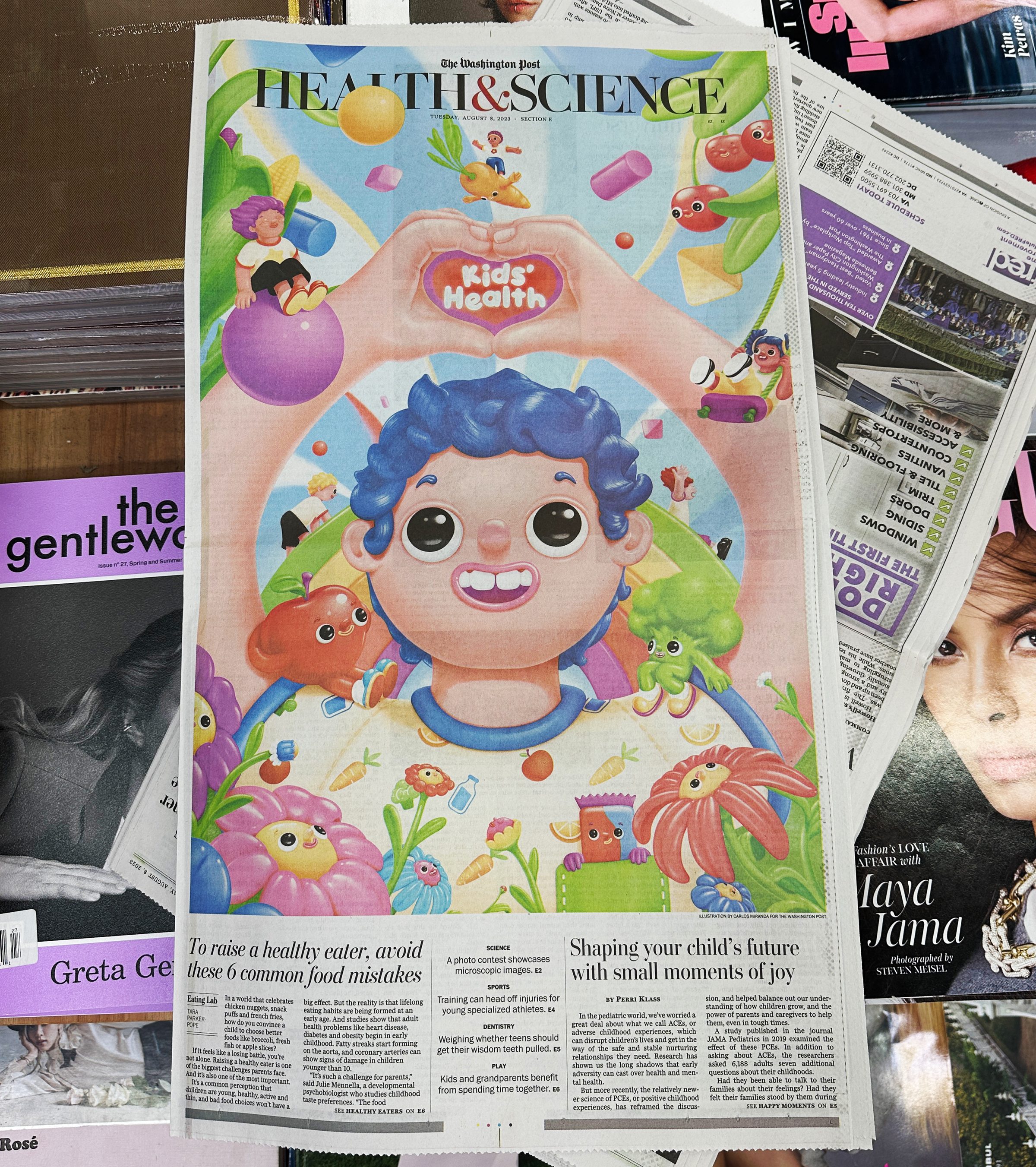 The printed Health & Science section, photographed among other newspapers